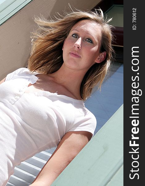 Beautiful model with wind blowing in her hair