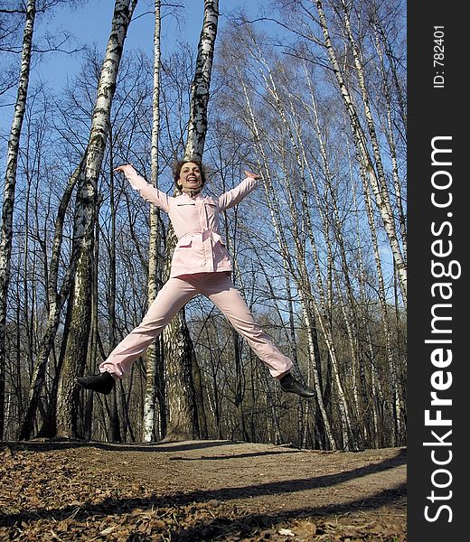 Jump girl in spring park. Jump girl in spring park