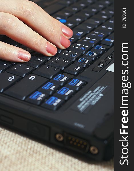 Woman typing with laptop. Woman typing with laptop