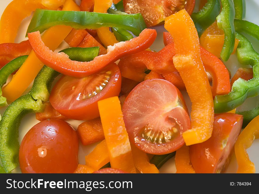 Colorful Sliced, Tomatoes And Bell Peppers