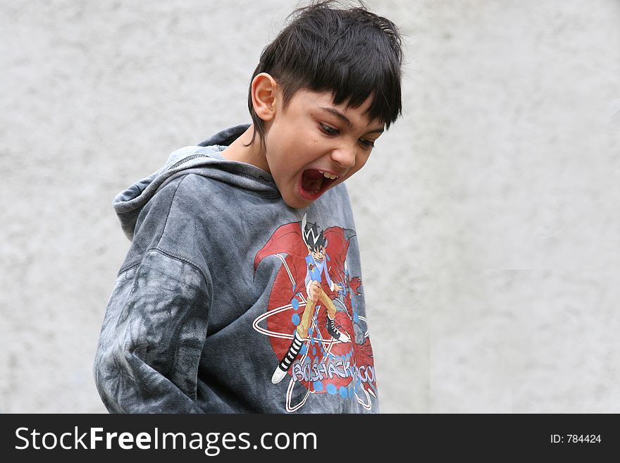 A young boy screaming