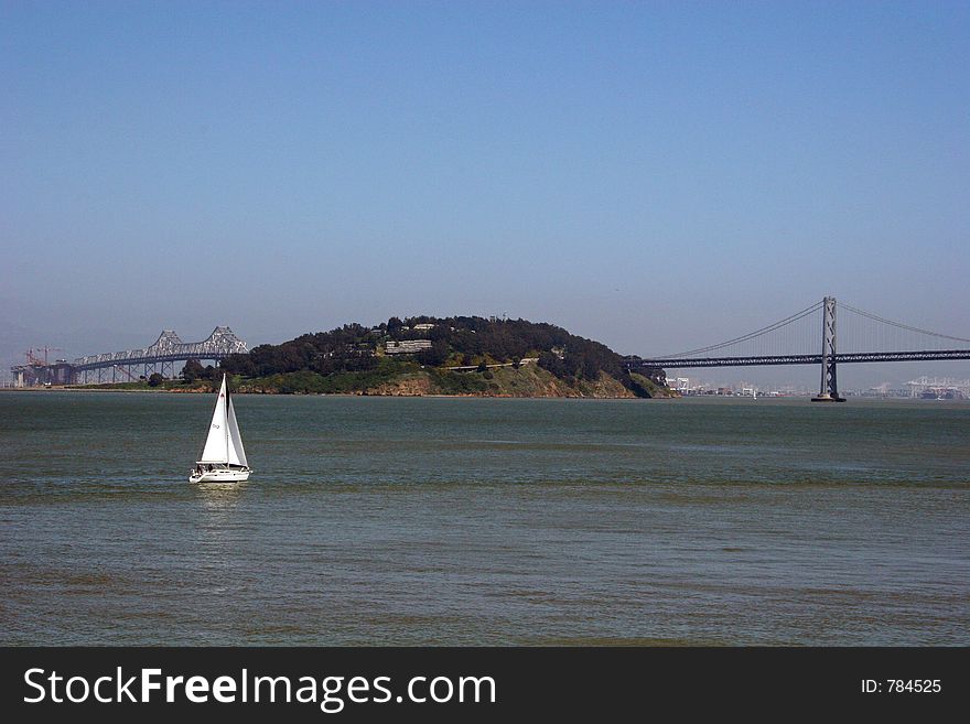 Bay Bridge And Sailboat