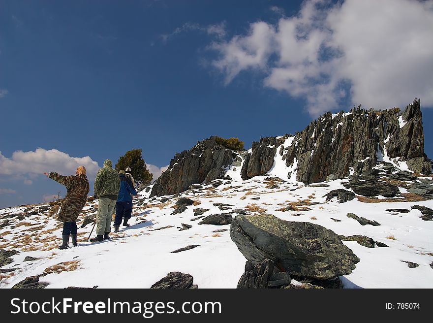 Climbers, mountains and blue sky. Altay, Russia.