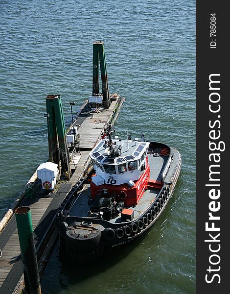 Tug boat docked at marina