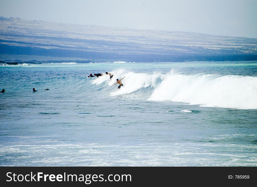 Group of guys surfing. Group of guys surfing
