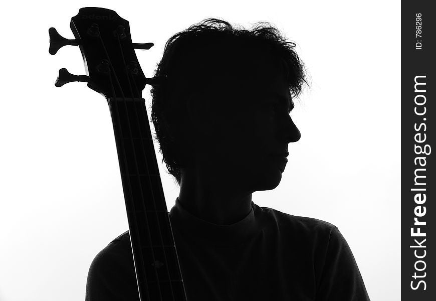 Silhouette from a woman and a guitar. Silhouette from a woman and a guitar