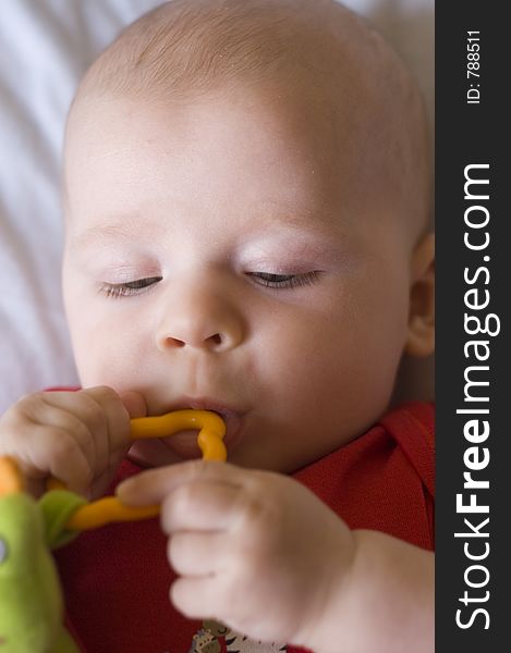 Baby with toy photo