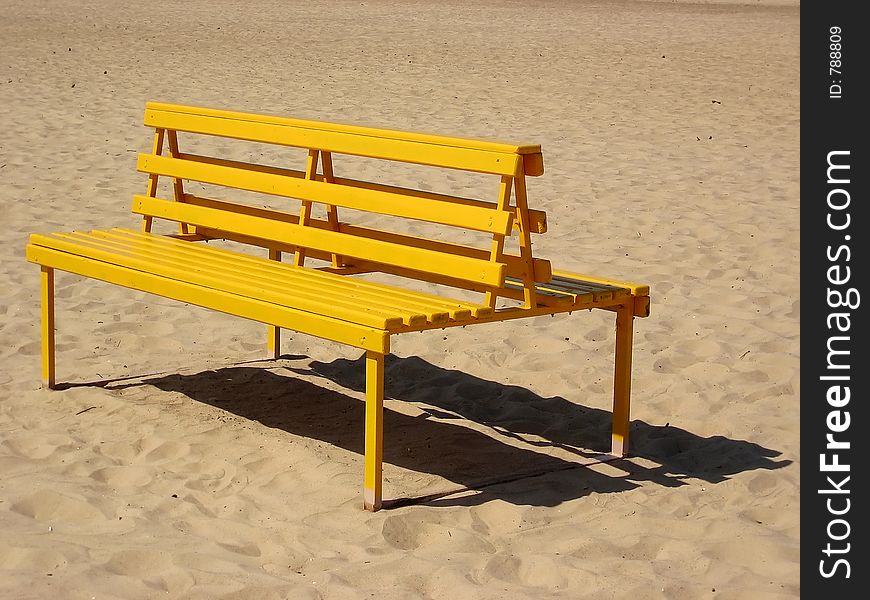 Yellow  wooden bench.