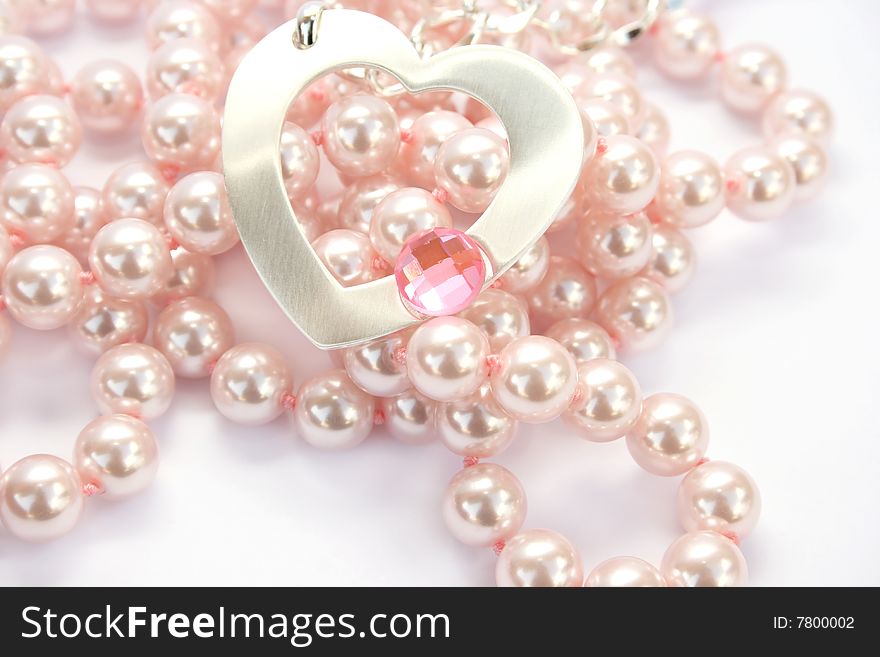 Necklace with heart and pink stone on it,pink pearls. Necklace with heart and pink stone on it,pink pearls.