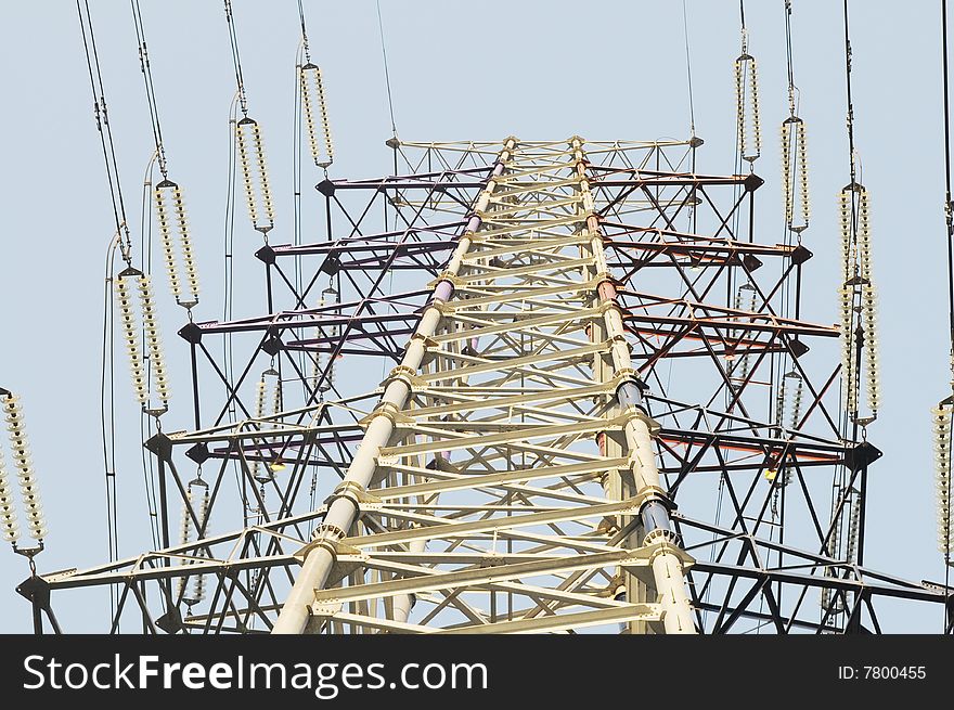 The hign voltage electricity pylon with power lines. The hign voltage electricity pylon with power lines.