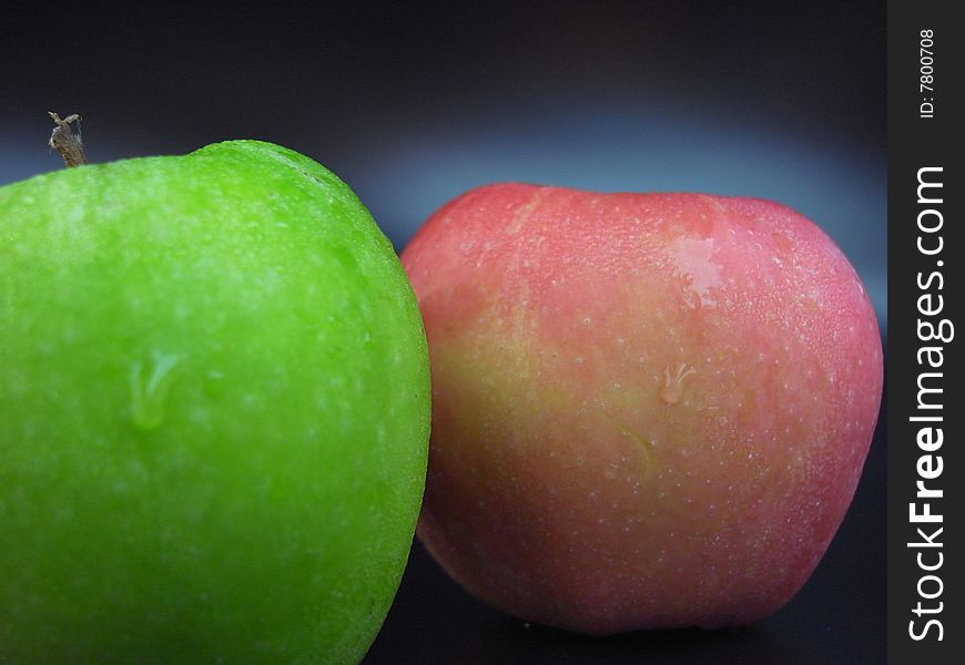 Close-up shot green & red apple