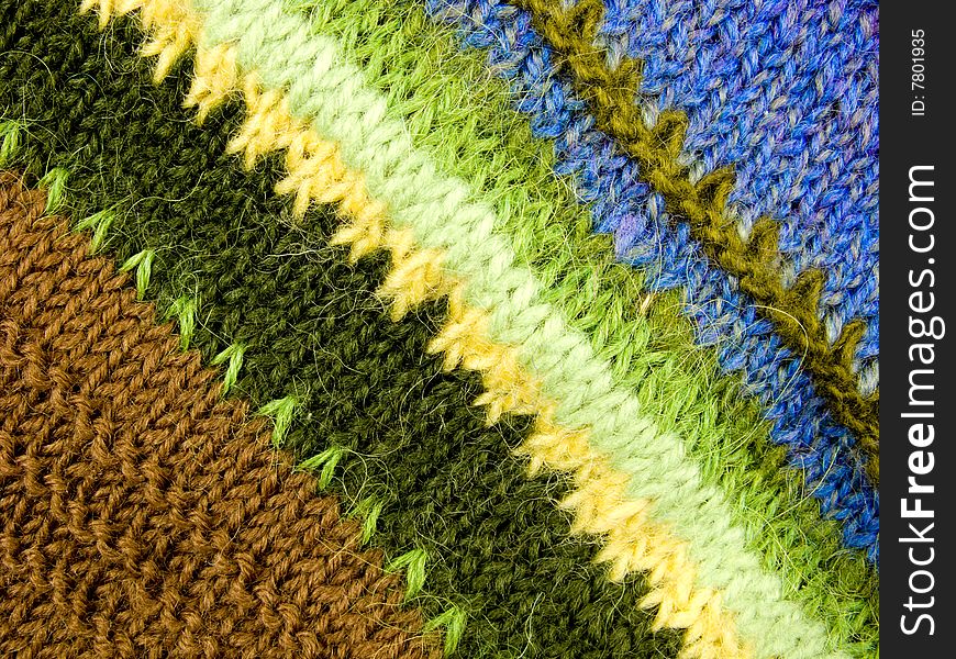 Woolen Texture From The Threads Of Many Colors.