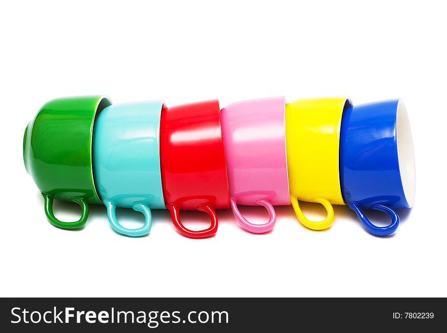 Beautiful color cups on a white background