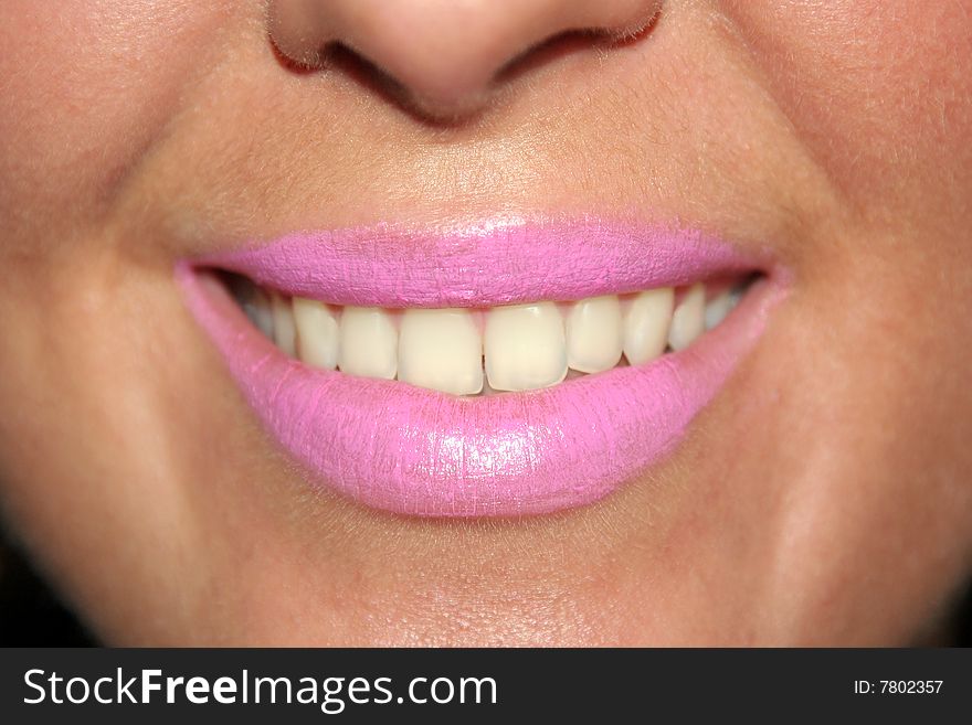 Close up of smiling womans mouth and teeth. Close up of smiling womans mouth and teeth