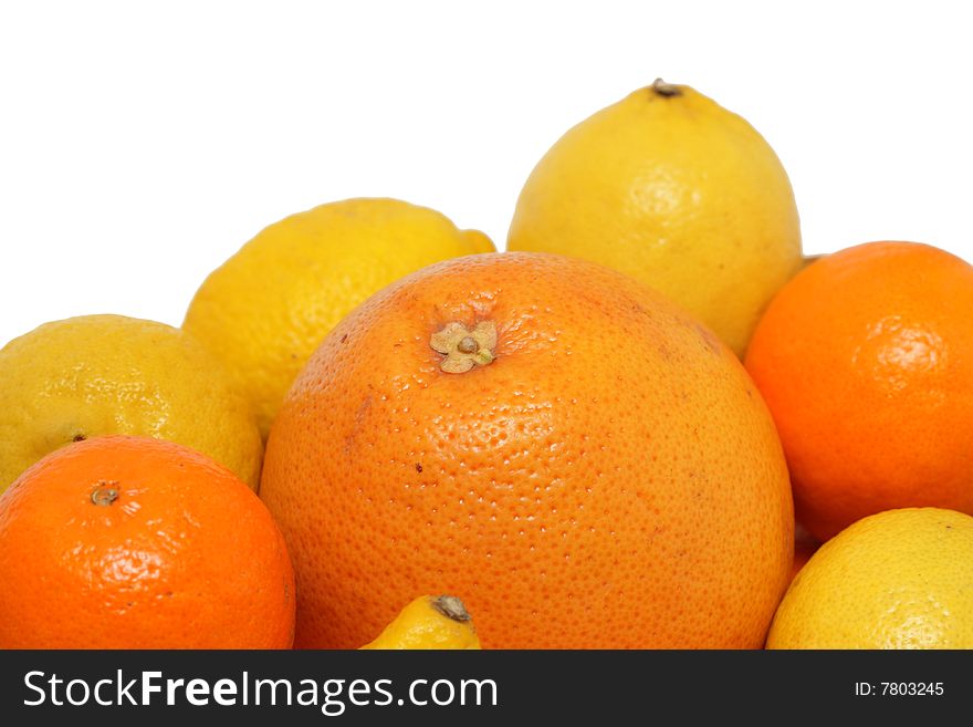 Lemons, oranges, grapefruit isolated on a white background. Lemons, oranges, grapefruit isolated on a white background