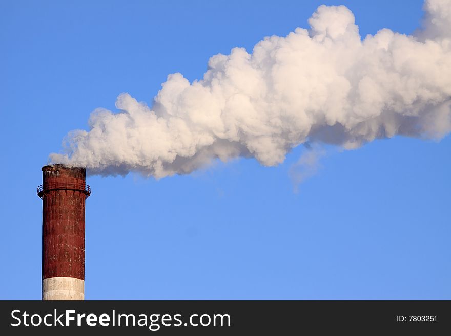 Power plant pollution on blue sky background. Power plant pollution on blue sky background