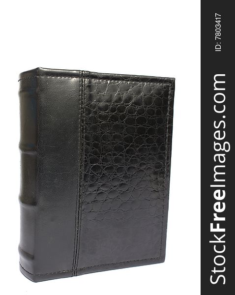 Black book in a leather cover on a white background it is isolated