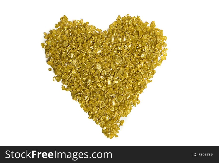 Golden heart made with decorative stones