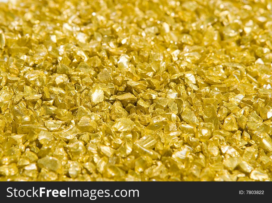 Background of golden shiny stones. Background of golden shiny stones