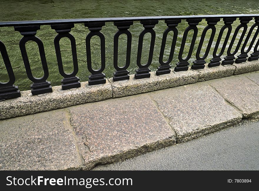 Iron Railings at Moika River Embankment in Saint Petersburg, Russia.