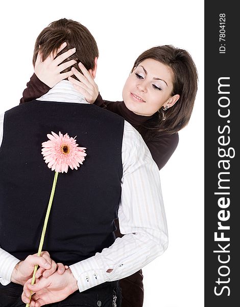Stock photo: an image of a beautiful loving couple with a flower. Stock photo: an image of a beautiful loving couple with a flower