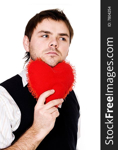 Stock photo: an image of a man with his chin on a red heart. Stock photo: an image of a man with his chin on a red heart