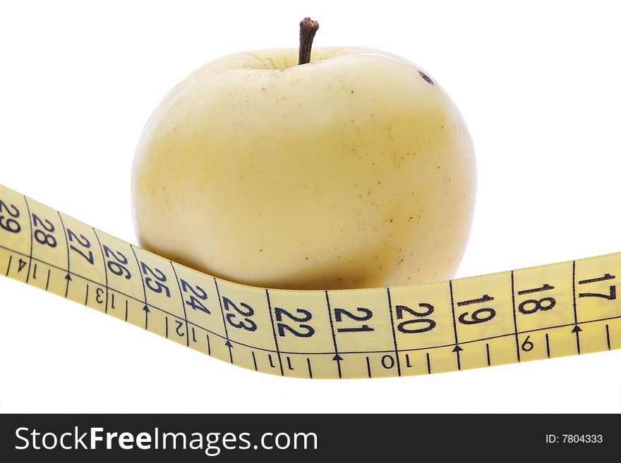 Yellow apple and measuring tape. Yellow apple and measuring tape