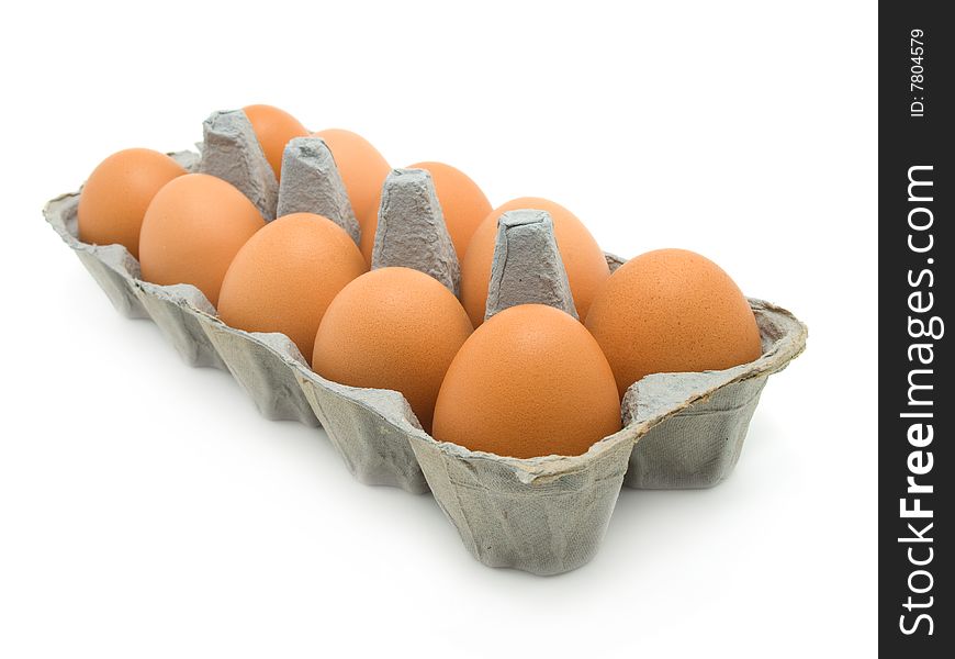 Eggs in a carton on white background