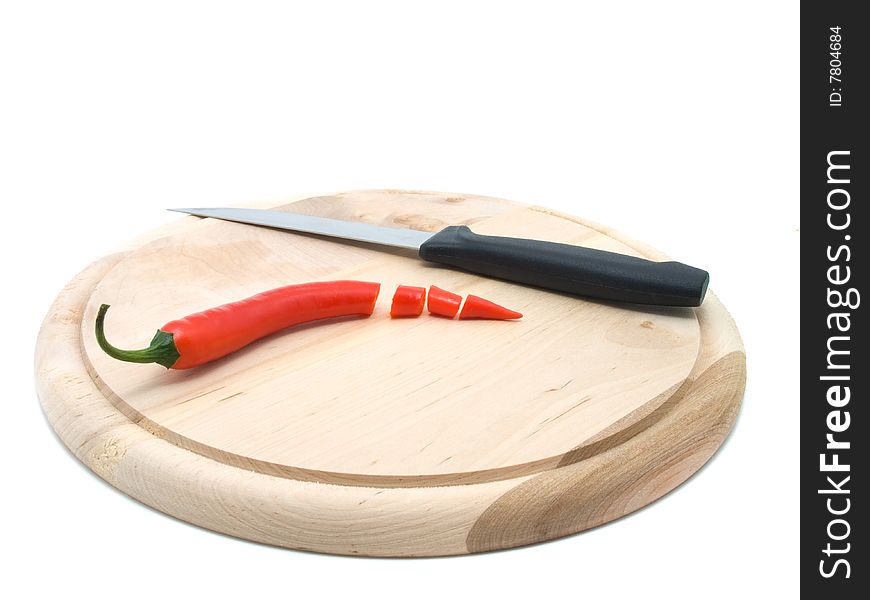 Red Pepper On A Wooden Broad
