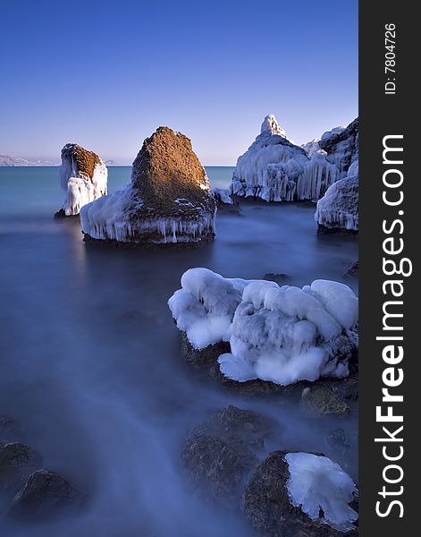 Beautiful long exposure coastal landscape in winter