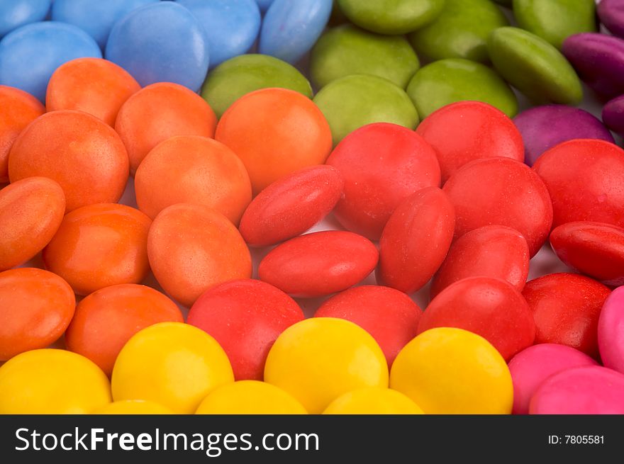 A rainbow of coloured candy. A rainbow of coloured candy