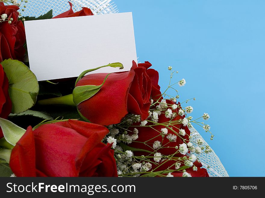 Red roses with white flowers and note. Red roses with white flowers and note