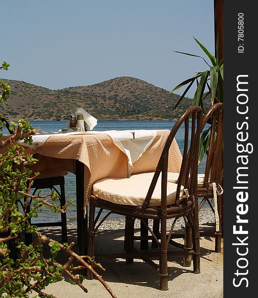 Cafe with a view of the sea and mountains