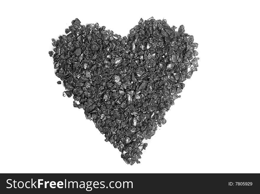 Heart made with black stones