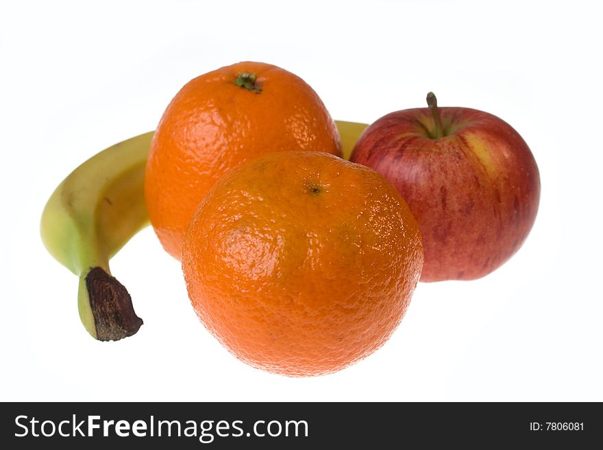 Fruit collection consisting of a banana, manderins and apple