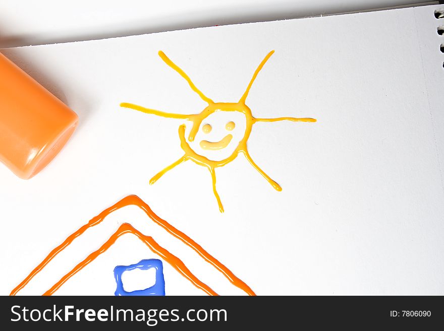 Drawing of the house with sun on paper. Drawing of the house with sun on paper