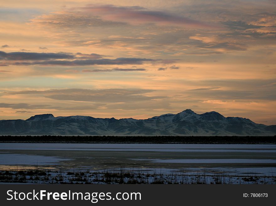 The Great Salt Lake and Utah Mountains during sunset in January. The Great Salt Lake and Utah Mountains during sunset in January.