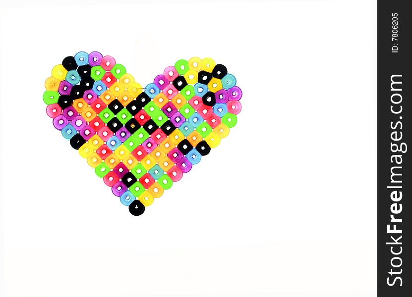 A multi-colored heart on an isolated white background