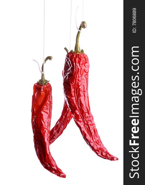 Dried red hot chili pepper isolated on white. Dried red hot chili pepper isolated on white