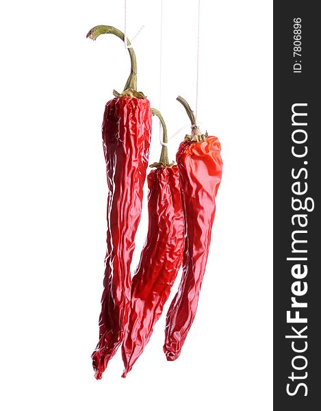 Dried red hot chili pepper isolated on white. Dried red hot chili pepper isolated on white