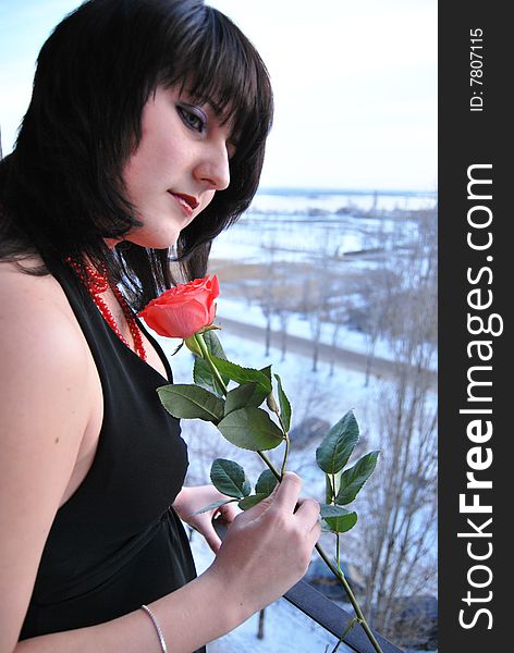 Female Portrait With Red Rose