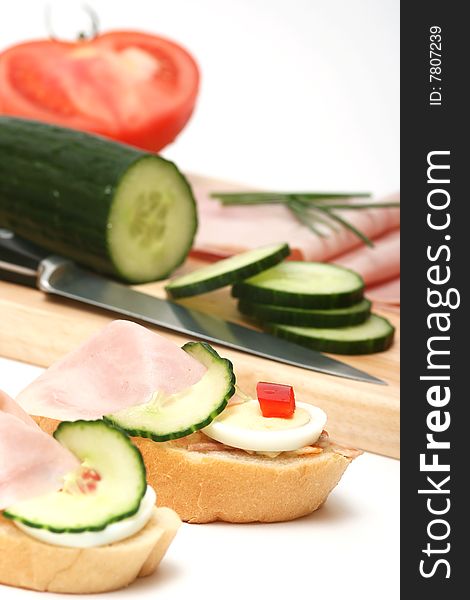 Ham,cucumber,egg and bread for breakfast