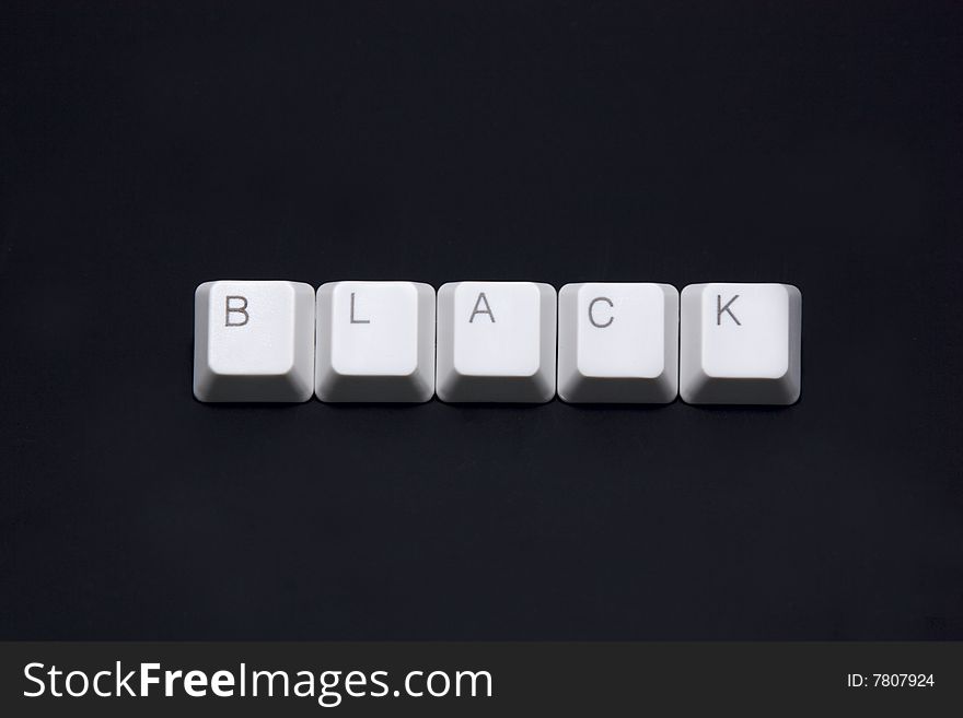 BUSINESS sign made of keyboard keys isolated on black background