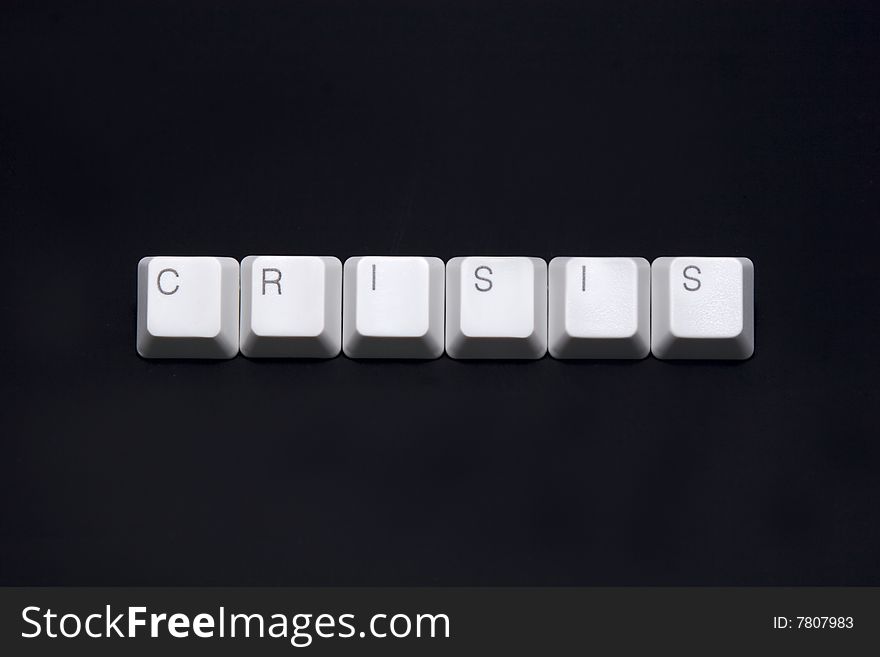 Crisis sign made of keyboard keys isolated on black background. Crisis sign made of keyboard keys isolated on black background