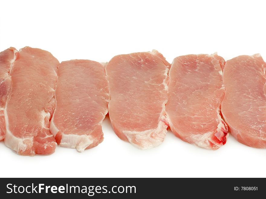 Raw pork meat on bright background