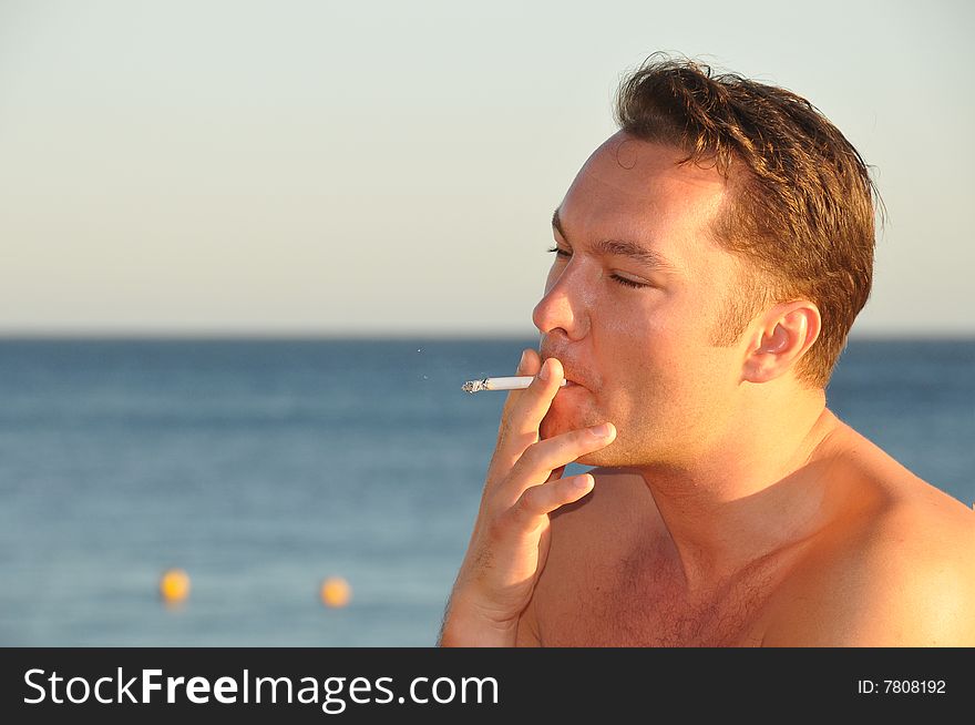 A young man smoking