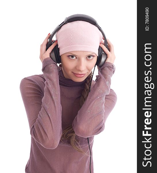 Happy young woman in headphones over white