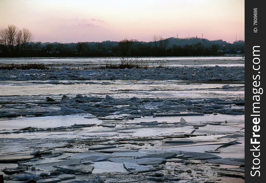 Ice on surface of river, cracked and broken after thaw. Ice on surface of river, cracked and broken after thaw