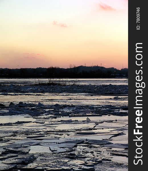 Ice on surface of river, cracked and broken after thaw. Ice on surface of river, cracked and broken after thaw