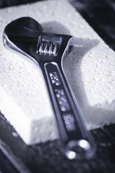 Adjustable Wrench On A Sponge Royalty Free Stock Images Adjustable Wrench On A Sponge Royalty Free Stock Images